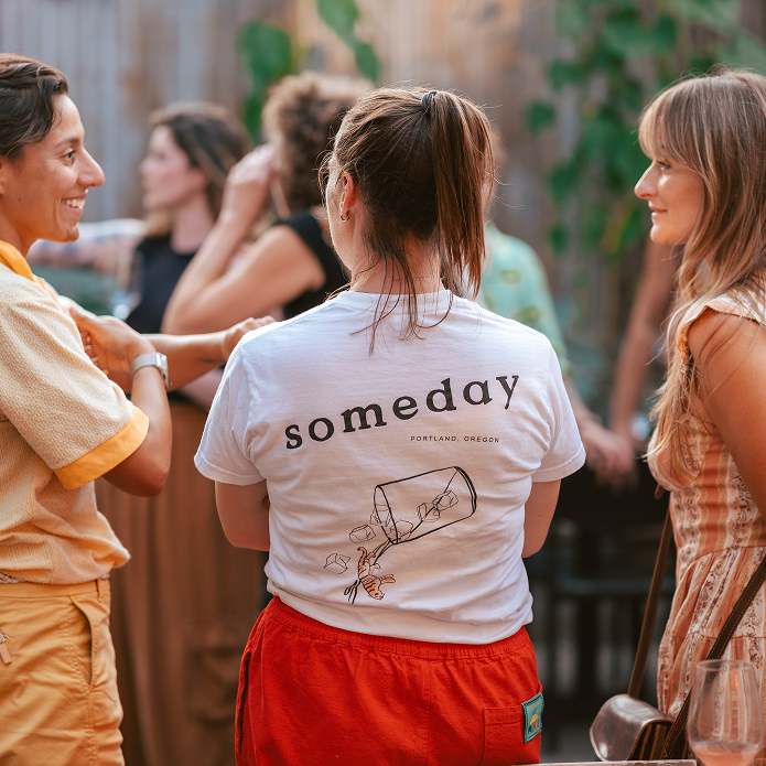 Women socializing outdoors at a Lesbian Culture Club Event